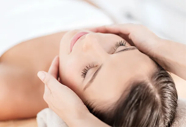 A colour photo a lady relaxing receiving a full body massage by Vicki Hooper Beauty - Headley Down and Grayshott